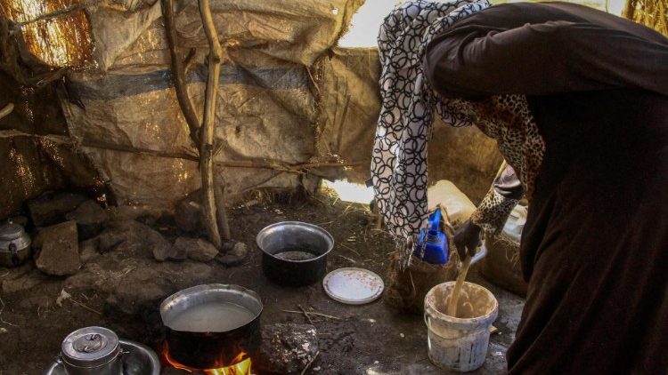 A displaced woman in a camp for displaced people