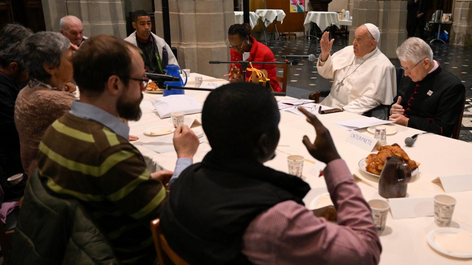 Pope meets group of refugees and pays tribute to late Belgian King Baudouin