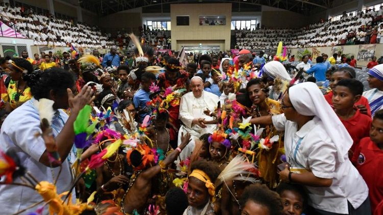 Pope Francis with children at school